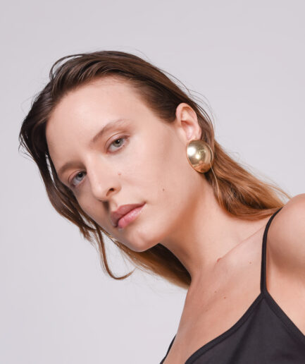 Oversized gold clip buttons
