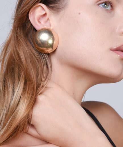 Oversized gold clip buttons